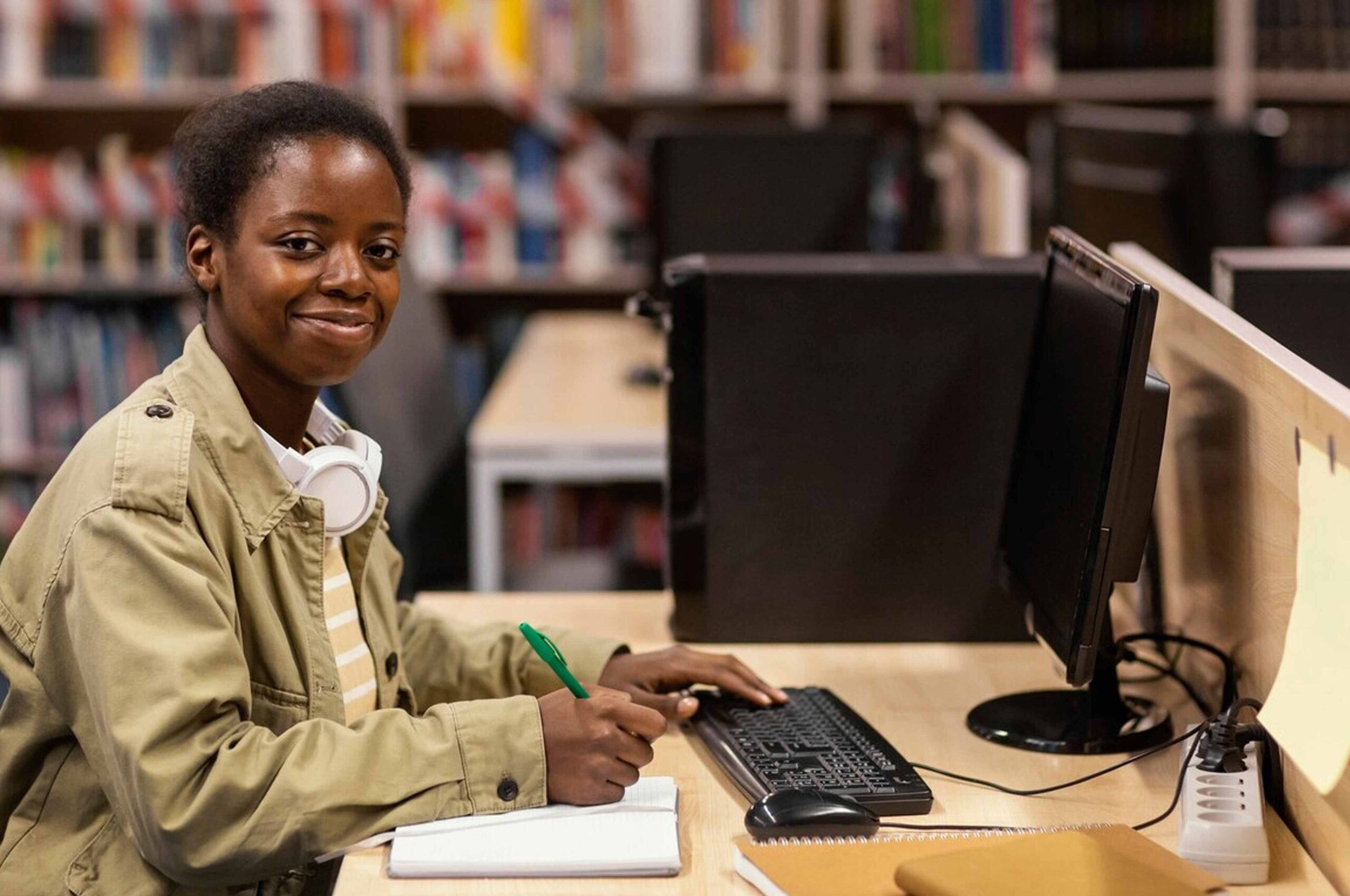 young african female teacher in the library